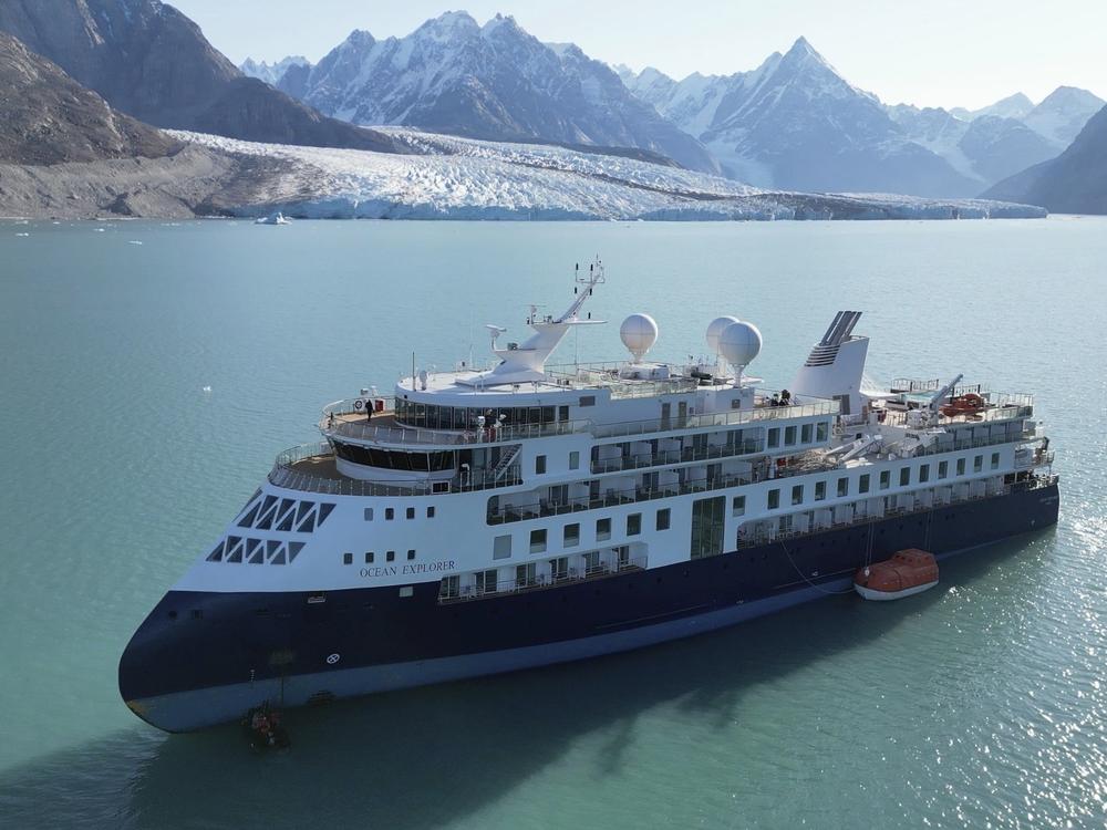 The Ocean Explorer, a Bahamas-flagged Norwegian cruise ship with 206 passengers and crew, which had run aground in northwestern Greenland, is pictured on Tuesday