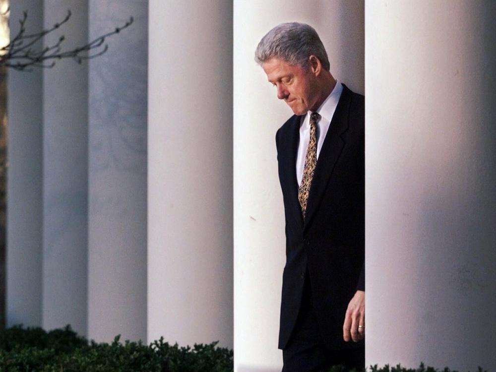 Former President Bill Clinton walks to deliver a short statement on the impeachment inquiry in the Rose Garden on Dec. 11, 1998, apologizing for his affair with intern Monica Lewinsky.
