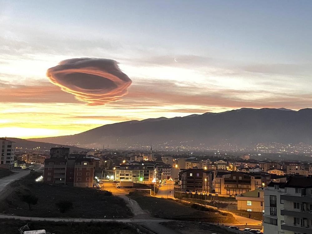 Saucer-like lenticular clouds appear over Turkiye's Bursa province in the early morning hours of January 19, 2023.
