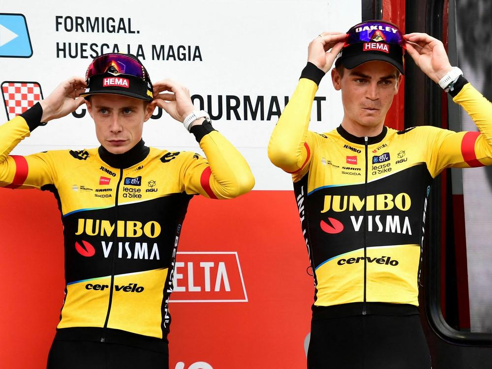 Sepp Kuss has gotten help from his accomplished teammates, including Danish rider Jonas Vingegaard (left). The two are seen here after stage 13 of the 2023 La Vuelta, the cycling grand tour race of Spain.