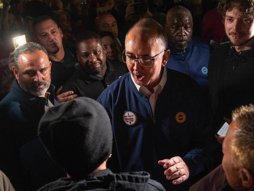 United Auto Workers president Shawn Fain speaks outside of the UAW Local 900 headquarters across the street from Ford's Michigan Assembly Plant in Wayne, Michigan on September 15, 2023.