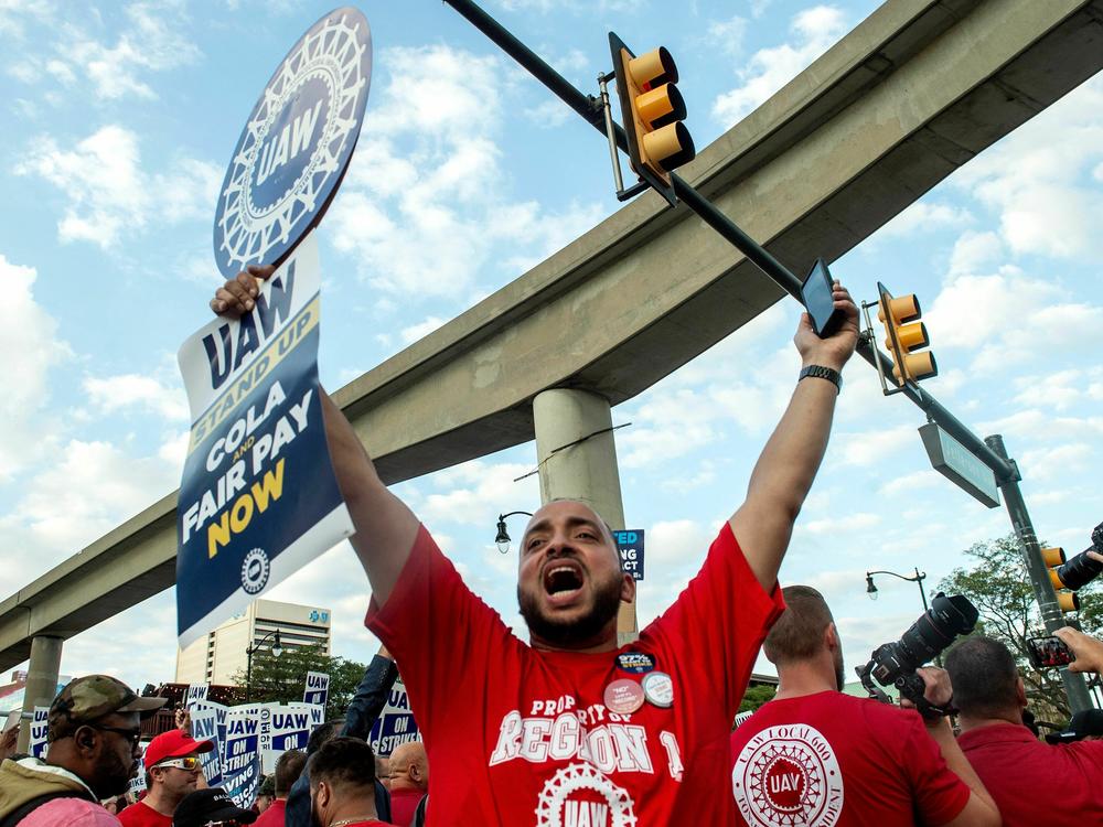 Members of the United Auto Workers (UAW) union march through the streets of downtown Detroit following a rally on the first day of the UAW strike in Detroit, Michigan, on September 15, 2023. Workers at the 