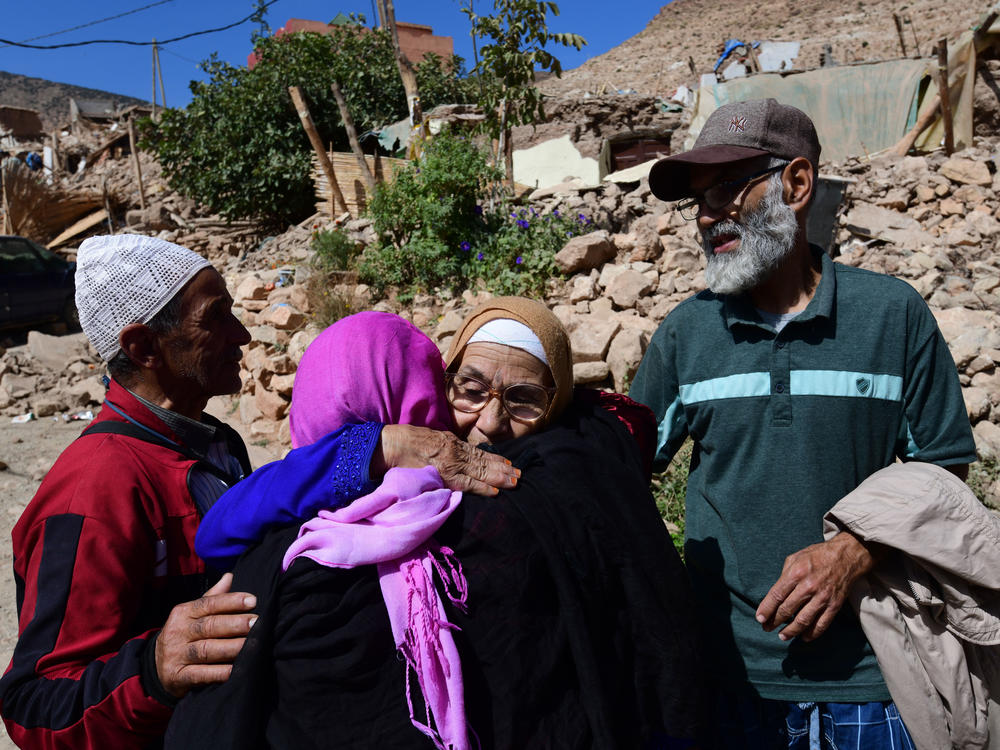 Boujemaa and Aicha Ounasser are embraced on returning to Tnirte after the earthquake. 
