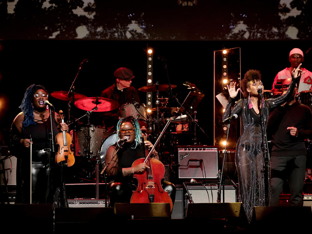 Chauntee Ross (left, with violin) and Monique Ross (center, with cello) of SistaStrings perform with Allison Russell in New York City in March 2022. The duo now plays as part of Brandi Carlile's band, and is nominated for the instrumentalist of the year award at the 2023 Americana Music Association Awards.