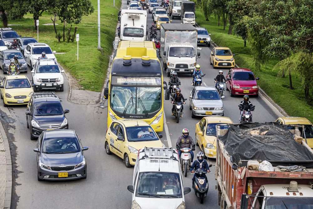 A bottleneck of merging traffic at rush hour on Avenida El Dorado and Calle 26 in Bogotá, Colombia.