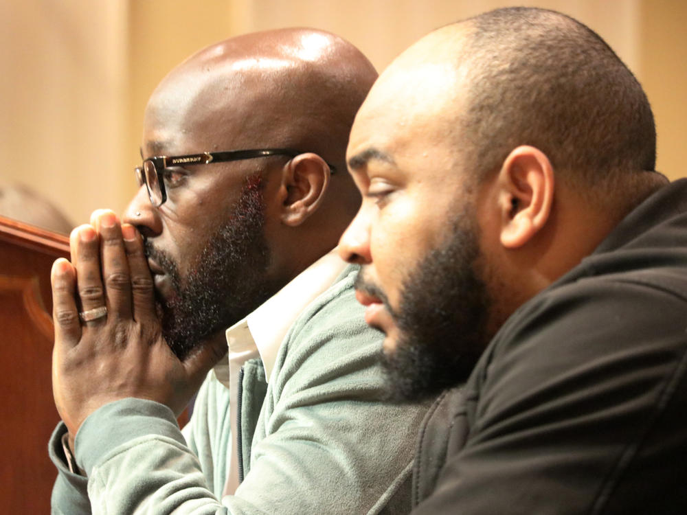 Eric Simmons (left) and Demetrius Smith, who were found innocent after spending years in prison for crimes they did not commit in Maryland, testify before state lawmakers for legislation to address how the wrongly incarcerated should be compensated by the state during a hearing on Feb. 26, 2020, in Annapolis, Md.