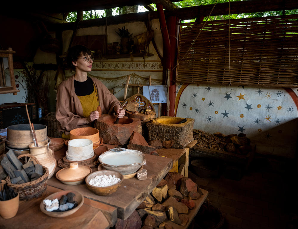 Claire Piot, 36, works as a painter and dyer at Guédelon Castle, preparing the colors for the interior walls.