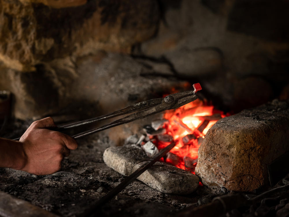 Lacroix makes the nails and other tools needed for the construction of the castle.