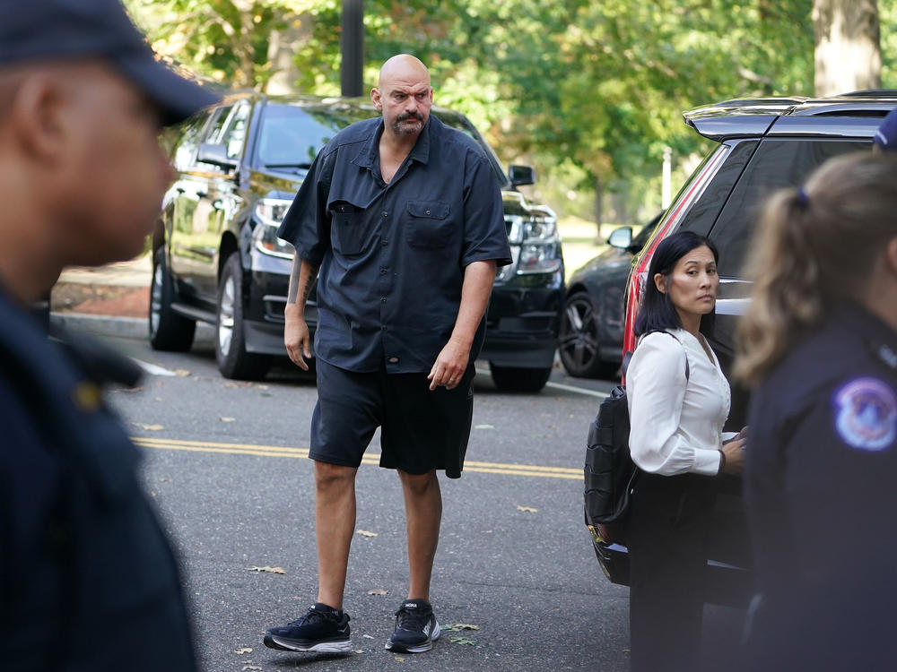 Sen. John Fetterman, D-Pa., arrives at the Russell Senate Office Building last Wednesday. The Senate's unwritten dress code will no longer be enforced as of this week.