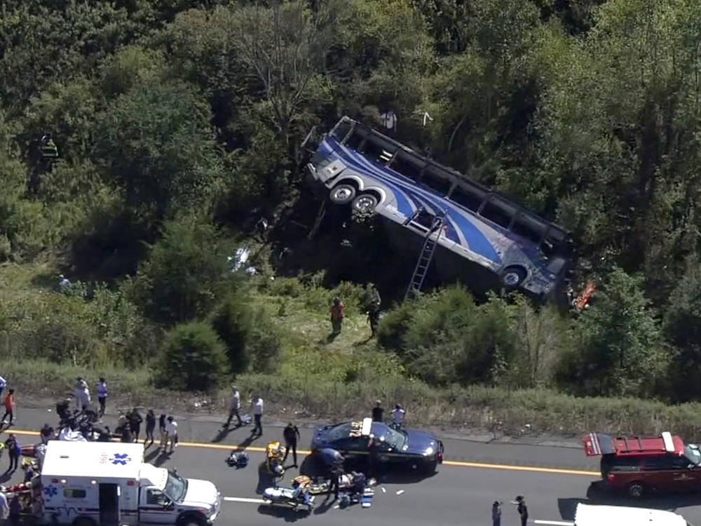 Emergency responders work the scene of a fatal bus crash, in Wawayanda, N.Y., Thursday, Sept. 21, 2023.