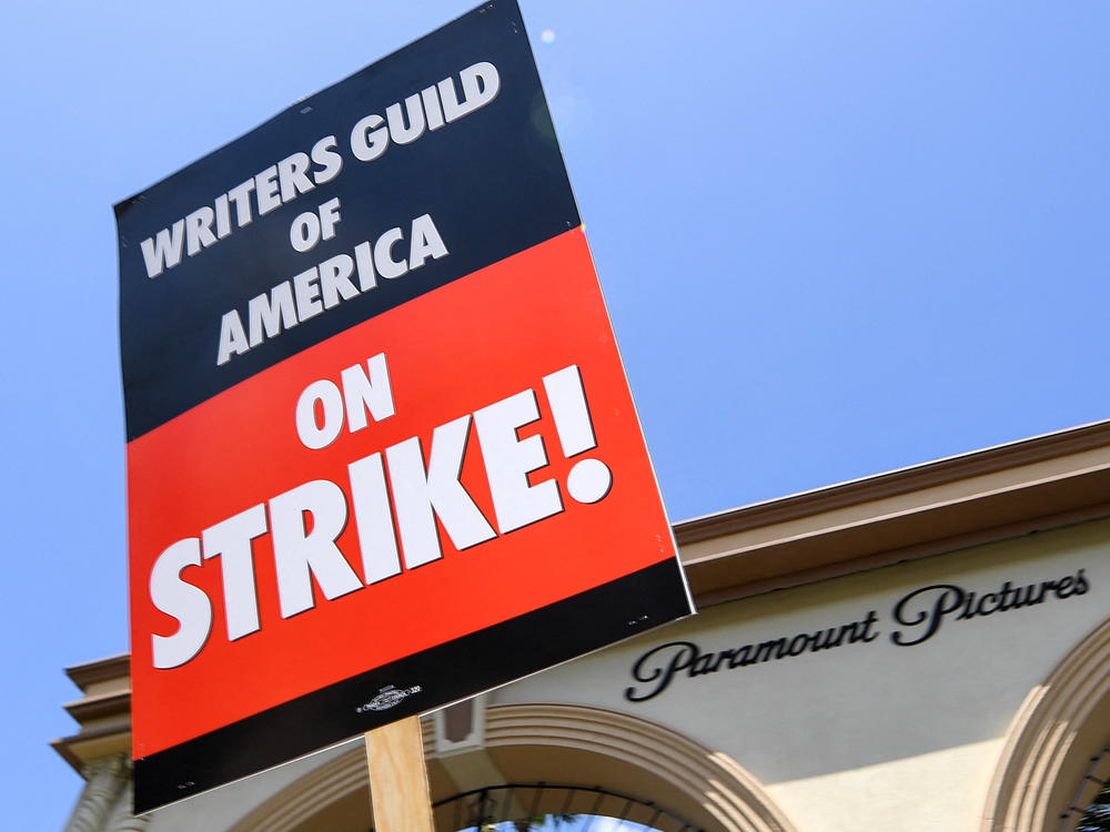 Screenwriters on strike protest in front of Paramount Studios on May 2, 2023 in Los Angeles, Calif.