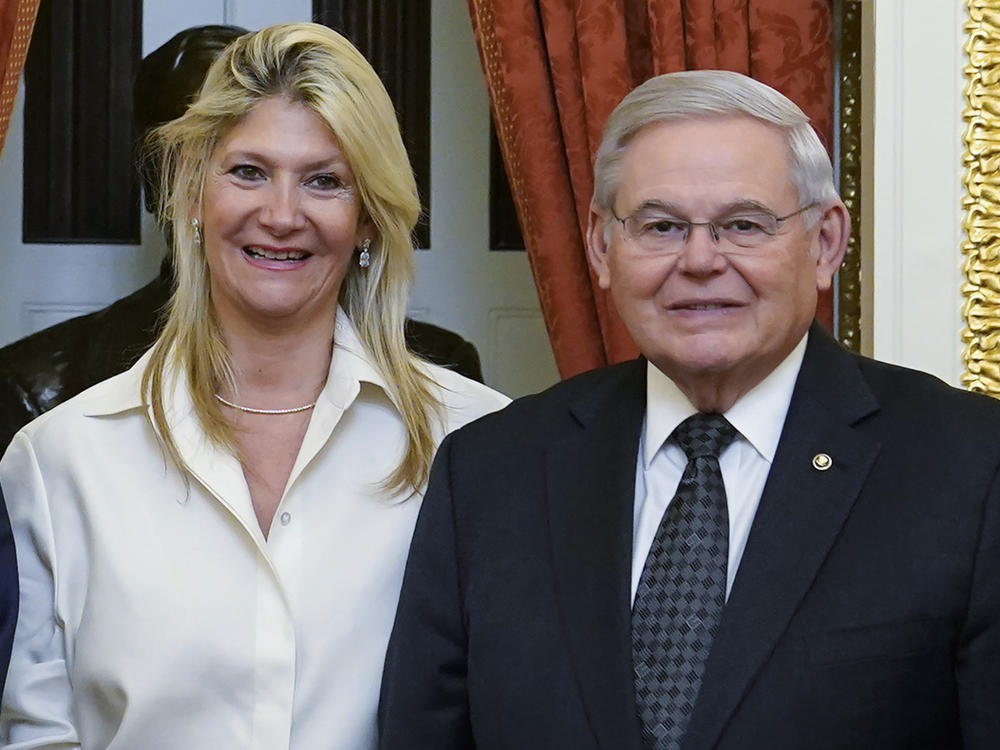 Sen. Bob Menendez, D-N.J., and his wife Nadine Arslanian pose for a photo on Capitol Hill on Dec. 20, 2022. The couple has been indicted on charges of bribery.