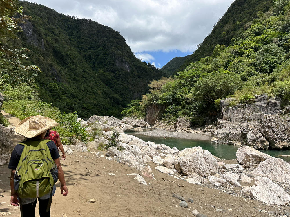 The giant white marble boulders that line the Agos River just north of the Philippine village of Daraitan are sacred to the Indigenous Dumagat people. They use the boulders to perform rituals to ward off sickness and keep their village safe. If the Kaliwa Dam is built upriver, the Dumagat say these rocks will be destroyed to make way for the increased water flow.