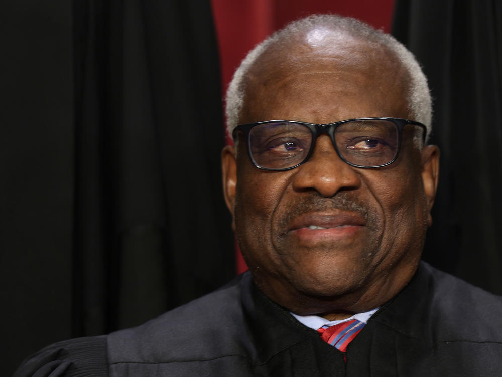 Supreme Court Associate Justice Clarence Thomas poses for an official portrait at the East Conference Room of the Supreme Court building last year.