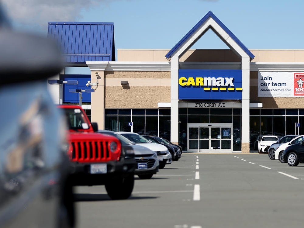 Cars are displayed on the sales lot at a CarMax dealership in Santa Rosa, Calif., April 11, 2023. Although the union surprised the auto industry by striking against all three companies at once, its plan is to gradually increase the plants or facilities impacted.
