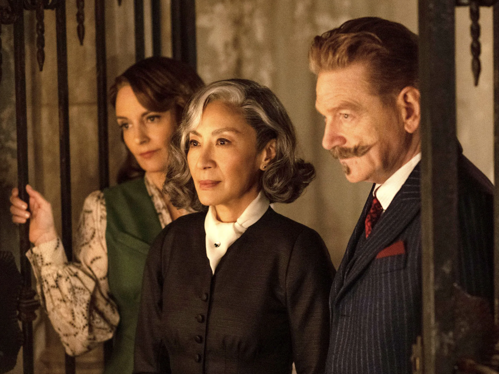 Tina Fey and Michelle Yeoh join Kenneth Branagh in <em>A Haunting in Venice.</em>