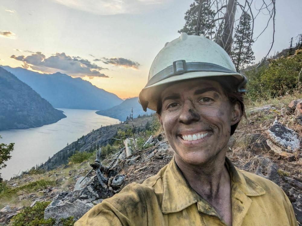 Wildland firefighter Rachel Granberg takes a selfie in her uniform