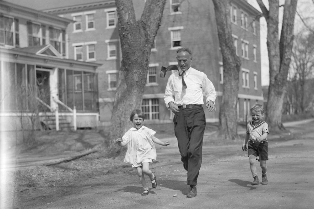 Clarence DeMar runs with his son and daughter, Keene, N.H.