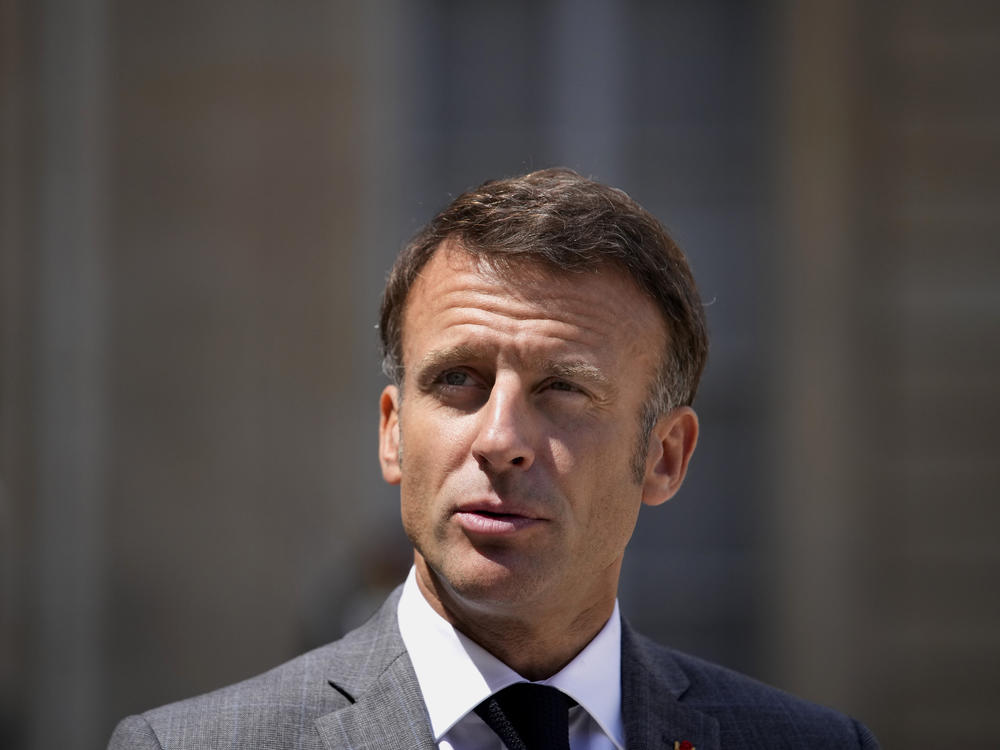 French President Emmanuel Macron, pictured in July in Paris, says France will end its military presence in Niger and pull its ambassador out of the country after its democratically elected president was deposed in a coup.