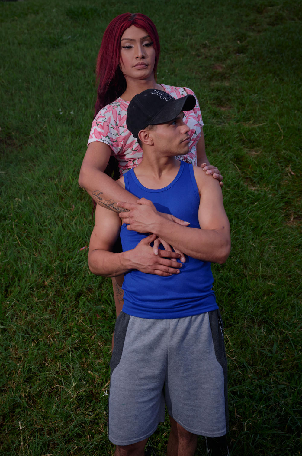 Samanta and Levi pose for a portrait in a public park in downtown Medellín. Samanta and Levi, both from Venezuela, met on the streets of Medellín. Levi emigrated when he was just 15 years old, but was soon abandoned by his father.