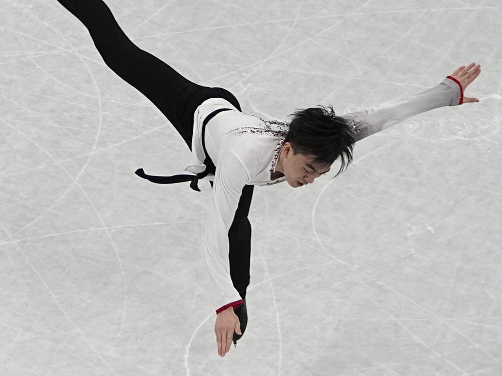 Vincent Zhou, of the United States, competes in the men's team free skate program during the figure skating competition at the 2022 Winter Olympics, Sunday, Feb. 6, 2022, in Beijing.