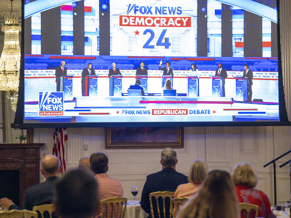 Republicans and others watch the broadcast at the official watch party of the Republican presidential candidates debate at The Richard Nixon Library and Museum in Yorba Linda, Calif., on Aug. 23.