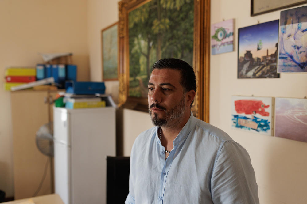 Attilio Lucia, the deputy mayor of Lampedusa, in his office on Sept. 20. Lucia is with Italy's right-wing Lega party.
