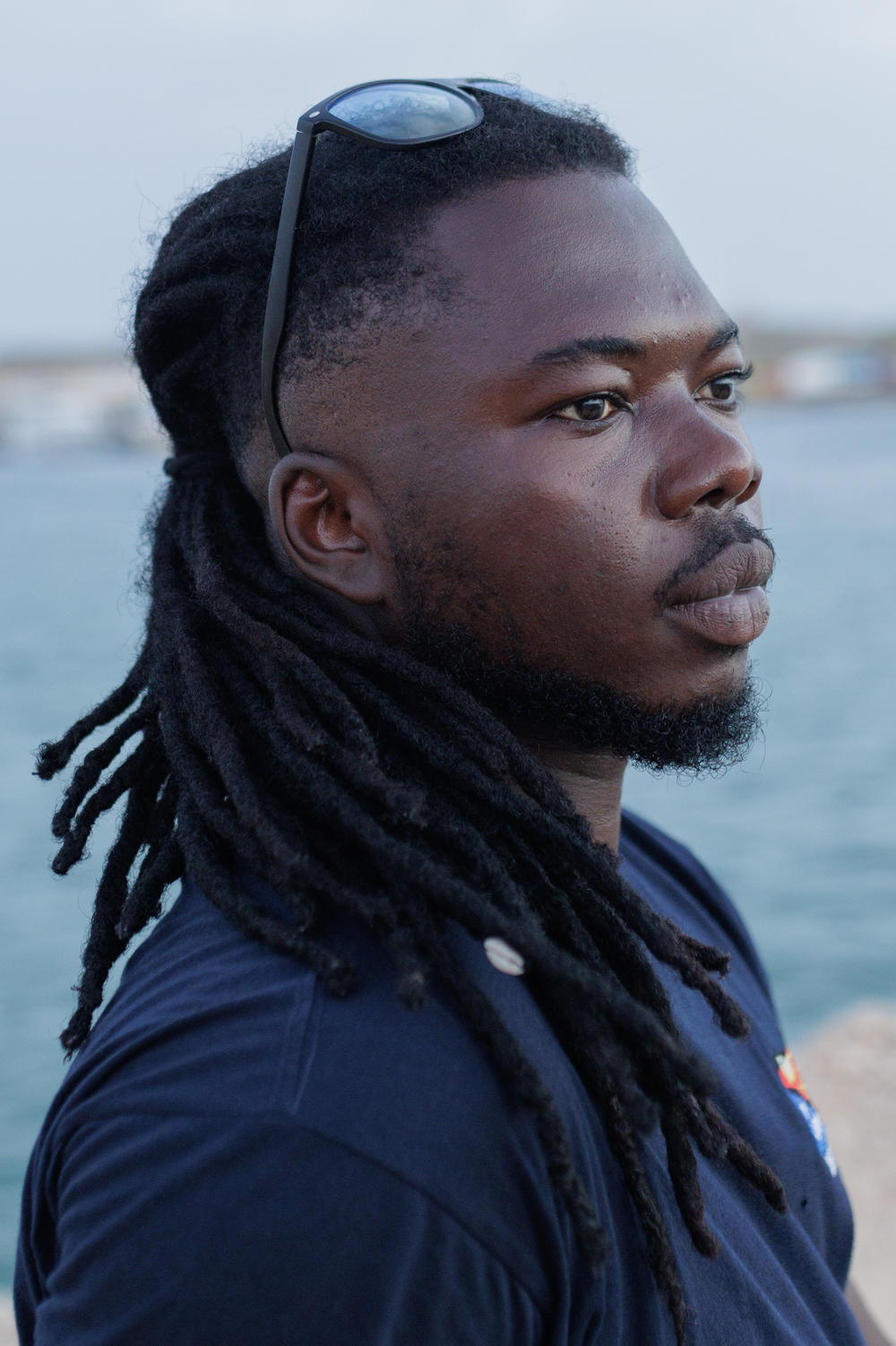 Moussa Koulibaly, 30, from Guinea, works as a cultural mediator in Lampedusa, Sept. 21. He arrived by boat in Italy in 2017.