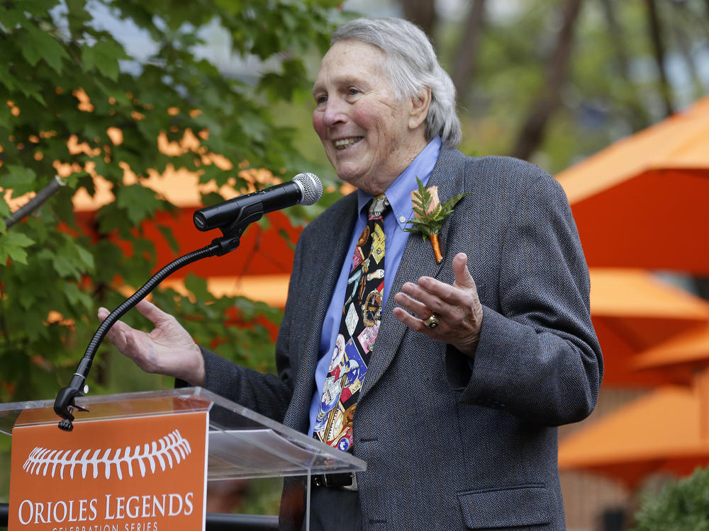 Former Baltimore Orioles third baseman Brooks Robinson speaks during a ceremony to unveil a statue of him in Baltimore on Sept. 29, 2012. Robinson, whose deft glovework and folksy manner made him one of the most beloved and accomplished athletes in Baltimore history, has died.