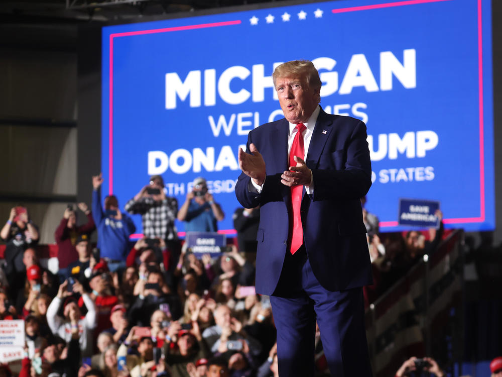 Former President Donald Trump arrives at a rally on April 2, 2022, near Washington, Mich.