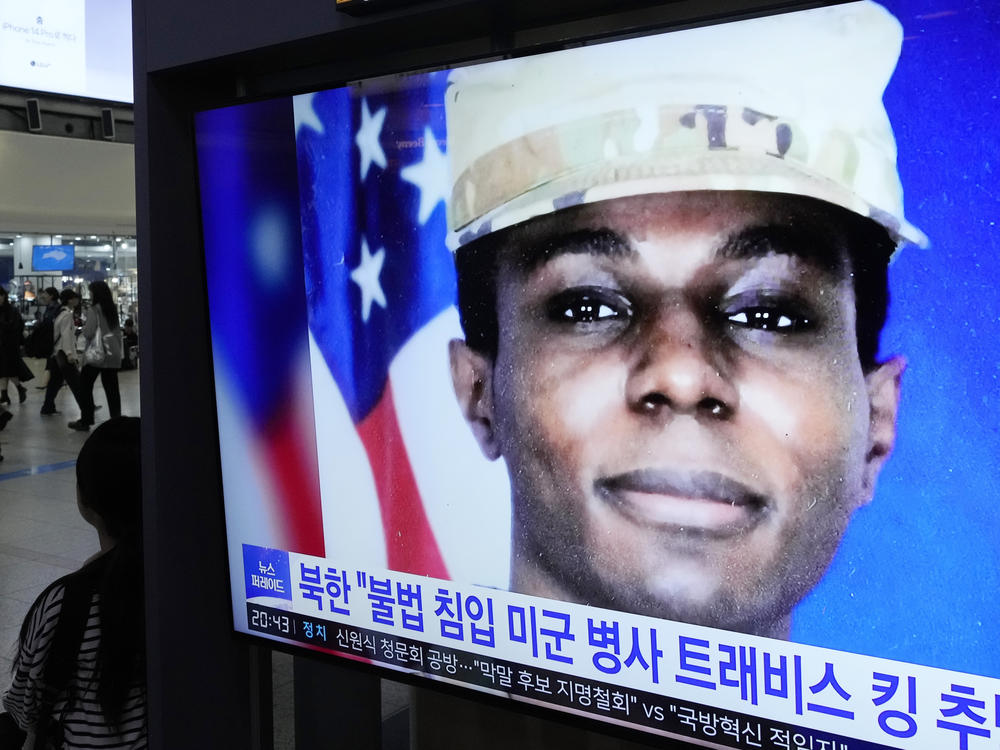 A TV screen shows a file image of U.S. soldier Travis King during a news program at the Seoul Railway Station in Seoul, South Korea, Wednesday. North Korea said Wednesday that it was expelling King, who crossed into the country through the heavily armed border between the Koreas in July.