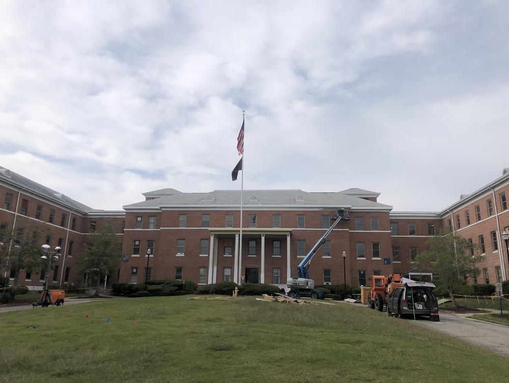 The main entrance of the Tuskegee VA embodies the Classical Revival architectural style prevalent in the 1920s. The campus is being considered for National Historic Landmark status.