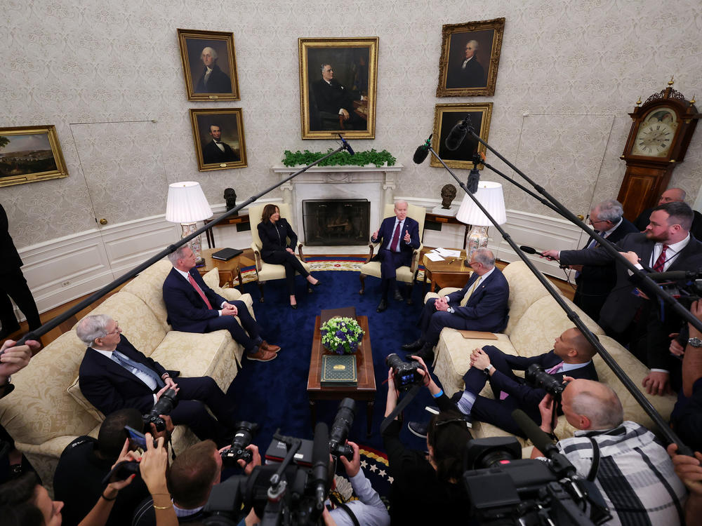 President Biden, Vice President Harris and congressional leaders — including House Speaker Kevin McCarthy — at a May 16 meeting in the Oval Office.