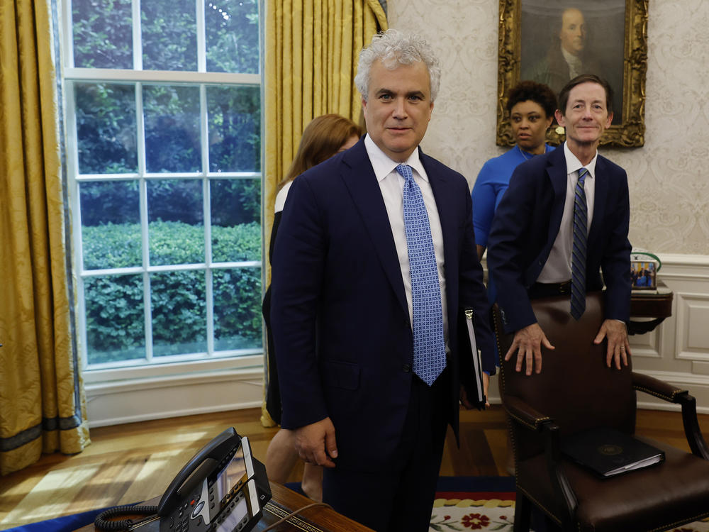 President Biden's chief of staff Jeff Zients, seen here in the Oval Office on May 16, 2023, is working with federal agencies to brace for a government shutdown this weekend.