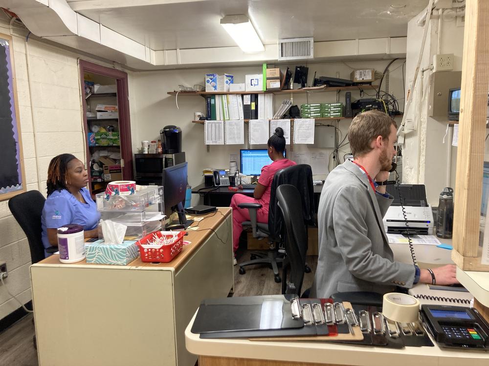 Medical assistant Lakeisha Pratt (left,) and receptionist David Bowers prepare for a busy day at North Side Christian Health Center, a safety-net health center in Pittsburgh. Even a temporary government shutdown could disrupt funding and force the clinic to cut back.