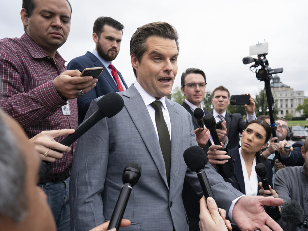 Rep. Matt Gaetz, R-Fla., talks to reporters just after House Speaker Kevin McCarthy's last-ditch plan to keep the government temporarily open collapsed on Friday.