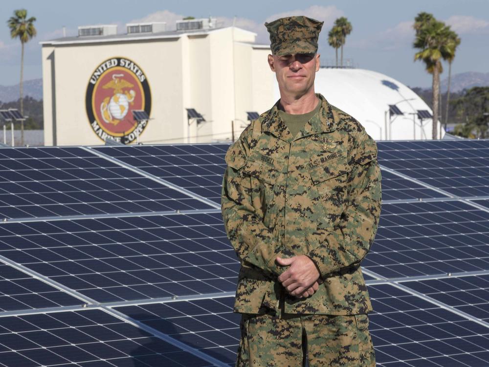 U.S Marine Corps Col. Thomas M. Bedell, the commanding officer of Marine Corps Air Station Miramar, poses for a photo at the station's Energy and Water Operations Center on MCAS Miramar.