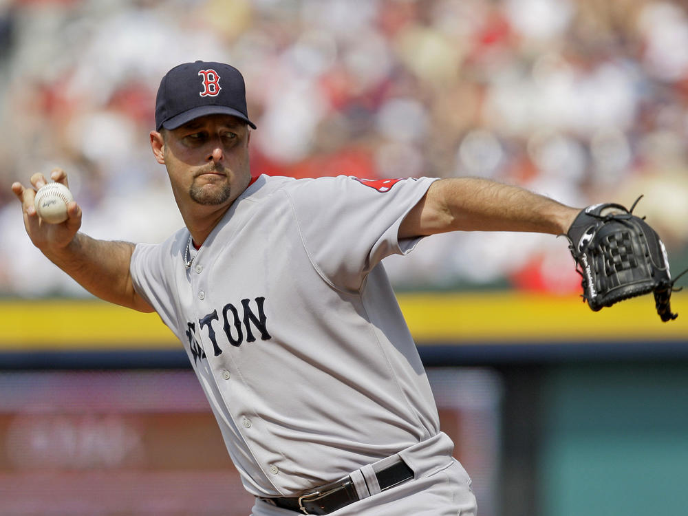 Boston Red Sox starter Tim Wakefield works in the second inning of a baseball game against the Atlanta Braves in Atlanta, June 27, 2009. Wakefield has died at age 57.