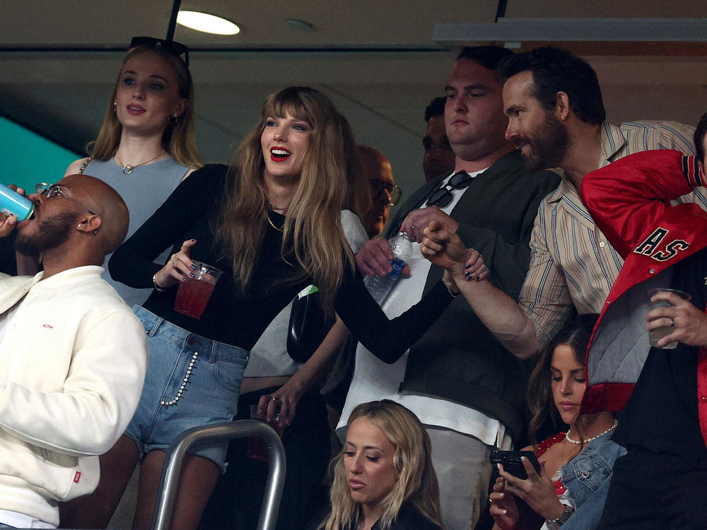 Singer Taylor Swift and actor Ryan Reynolds are seen ahead of the game between the Kansas City Chiefs and the New York Jets at MetLife Stadium on Sunday in East Rutherford, N.J.