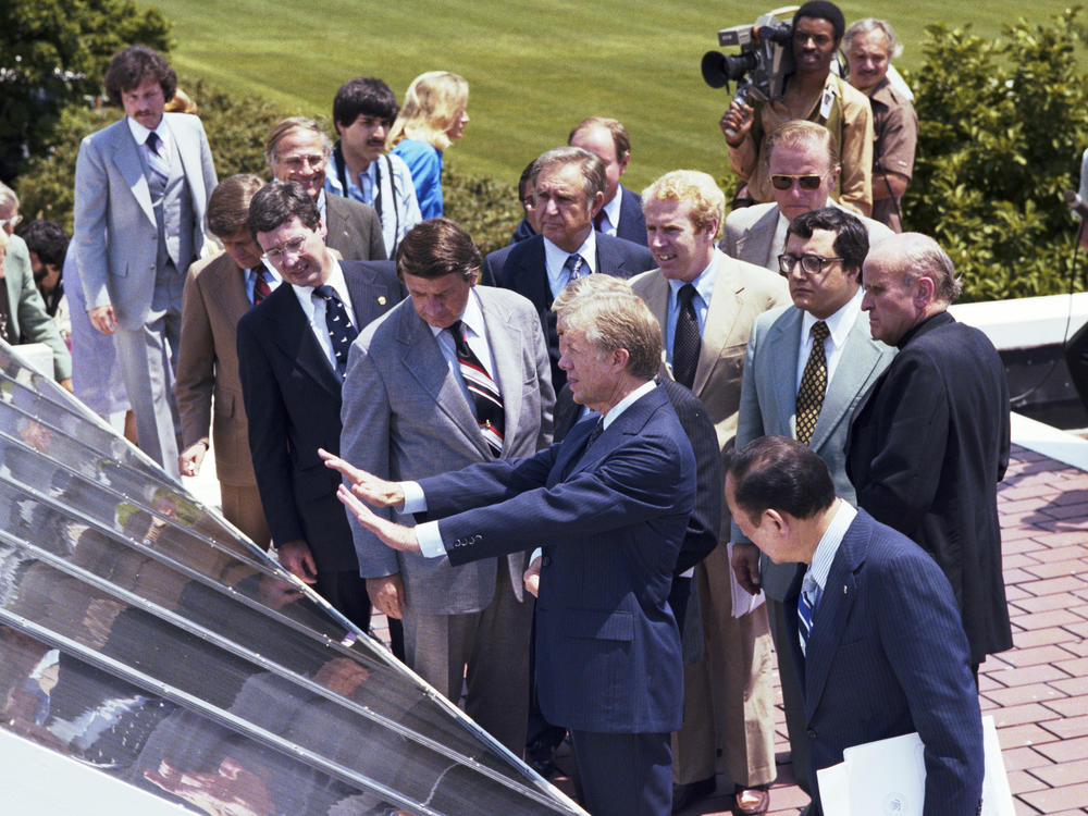 President Carter unveils solar panels on the White House roof on June 20, 1979, in what proved a short-lived experiment in energy efficiency. They were removed a few years later by the Reagan administration.