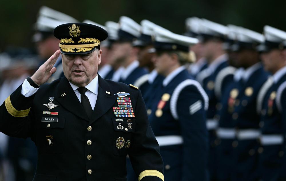 Milley reviews the troops during the Armed Forces Farewell Tribute in his honor at Joint Base Myer-Henderson Hall in Arlington, Virginia, on September 29.