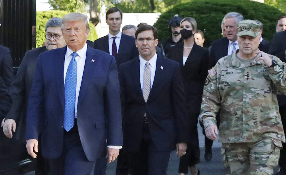 Gen. Mark Milley (right) appears with then President Trump as he departs the White House en route to St. John's Church in June 2020.