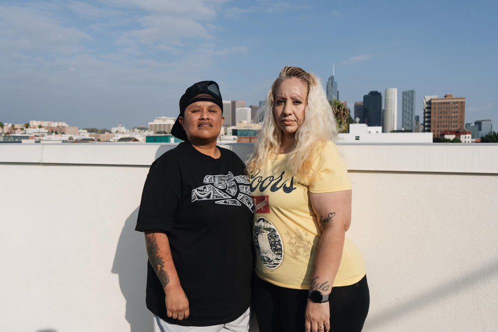Dulce Volantin (left) and her partner, Valarie Zayas, pose for a portrait on their rooftop in Los Angeles. When asked what this program has meant for her and her partner, Volantin chokes up as she says, 