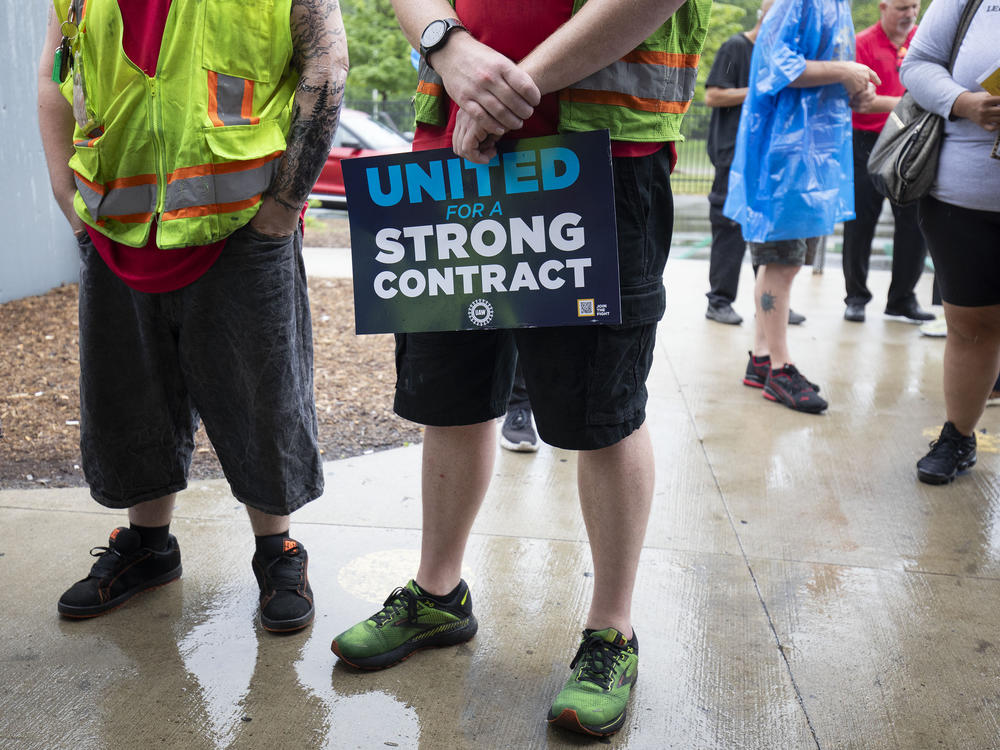 Ford workers meet with United Auto Workers President Shawn Fain at the Ford Michigan Assembly Plant in Wayne, Mich., on July 12, 2023. The UAW is fighting hard to regain the things they gave up before and during the 2008 Global Financial Crisis.