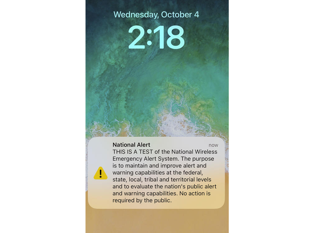 A national alert test is seen on a cellphone on Wednesday, Oct. 4, 2023. The government conducted its once-every-three-years nationwide test of the emergency alert system on Wednesday. Besides cellphone messages, alerts also went out on radio and television.