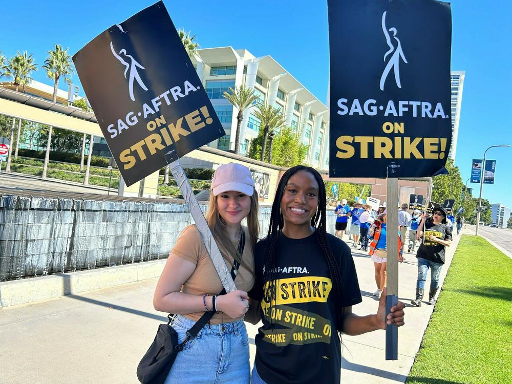 Outside Fox studios in Los Angeles, production assistant Allie Palm and SAG-AFTRA actress Desiree Woolfolk say they can't wait to get back to work.