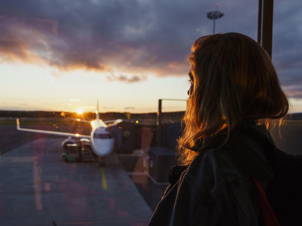 When Renée's boyfriend couldn't find his passport at the airport, she felt his anger rising.