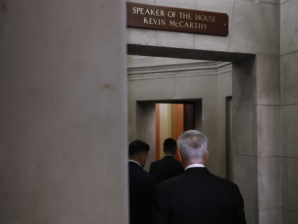 Rep. Kevin McCarthy, R-Calif., enters his office at the U.S. Capitol on Monday, the day before he was voted out as speaker.