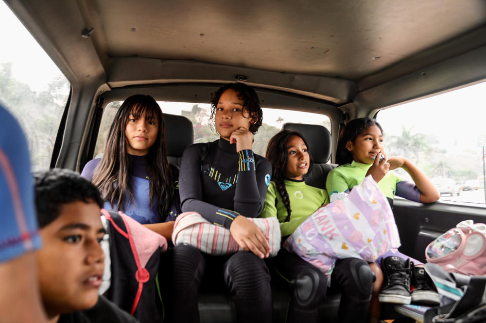 Surf students in the Alto Peru van on the way to the beach.
