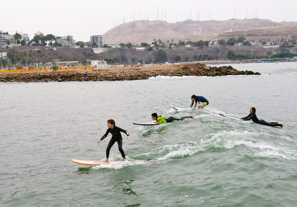 Alto Peru, a nonprofit in Peru, runs a surf school for kids in the community.